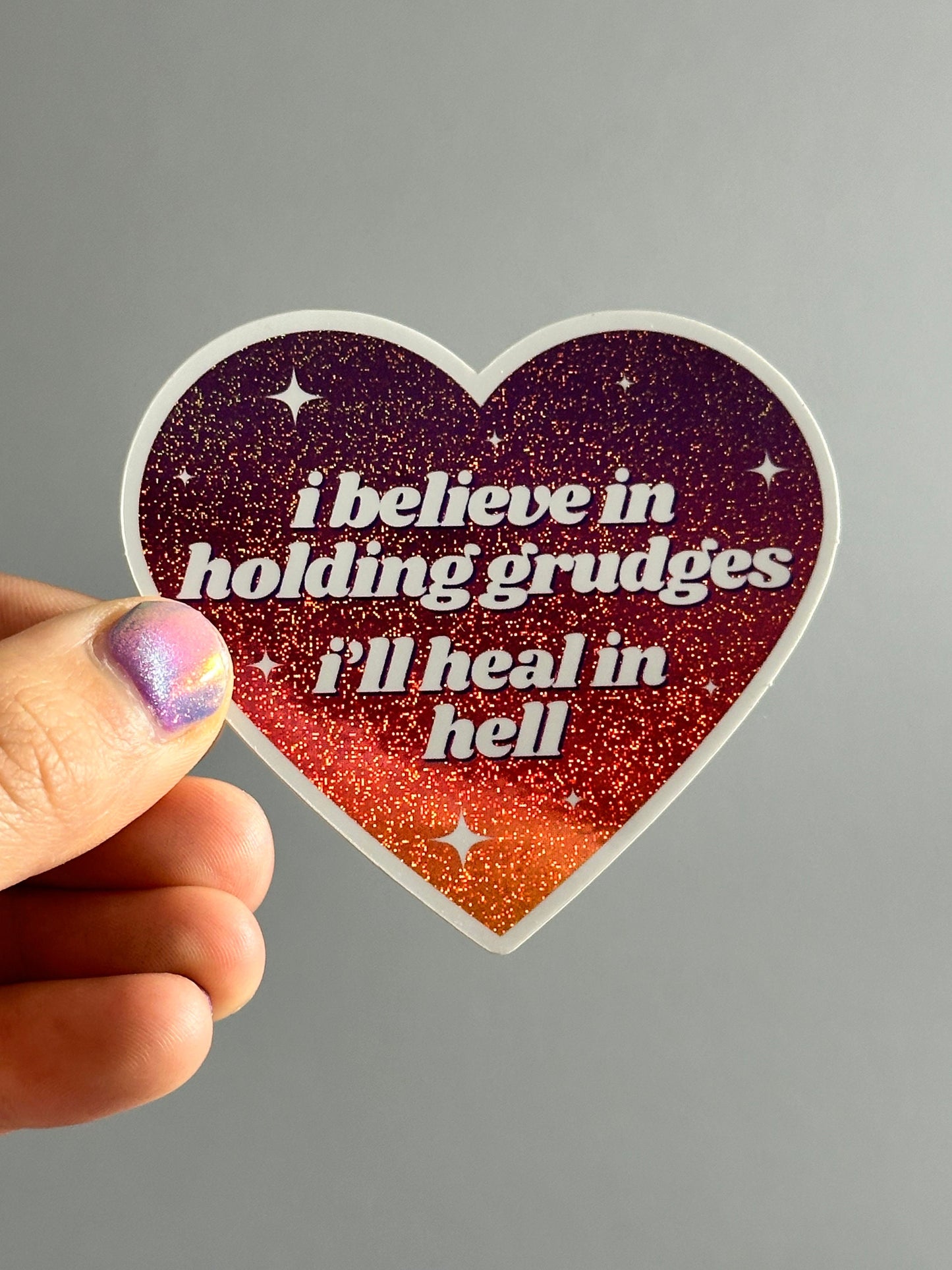 I Believe In Holding Grudges I’ll Heal In Hell Glittery Heart Sticker