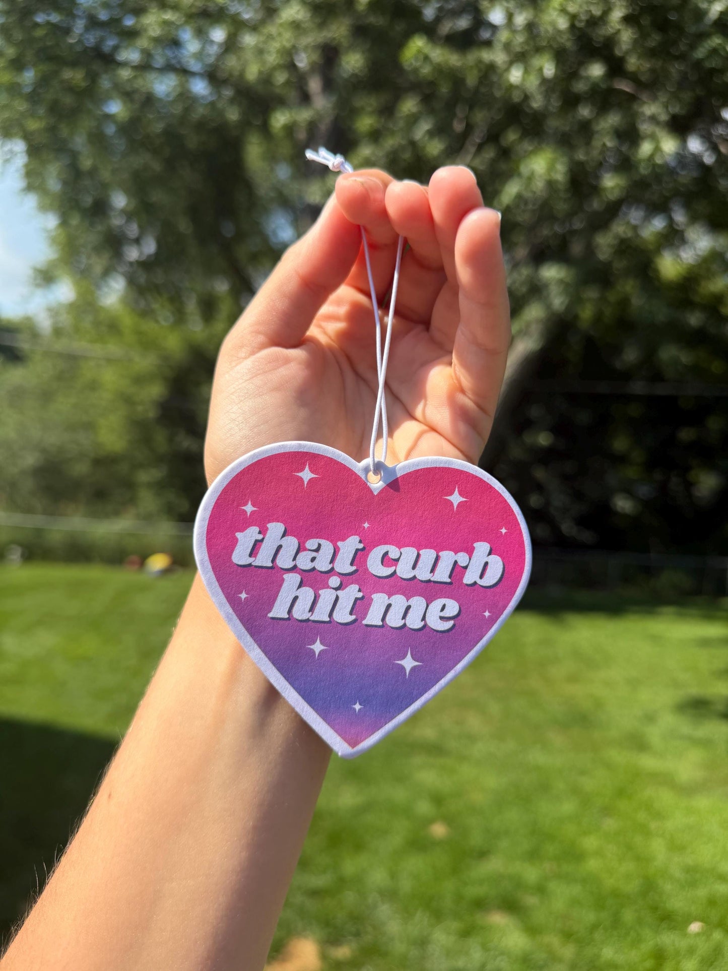 That Curb Hit Me Car Air Freshener - Rose Scent