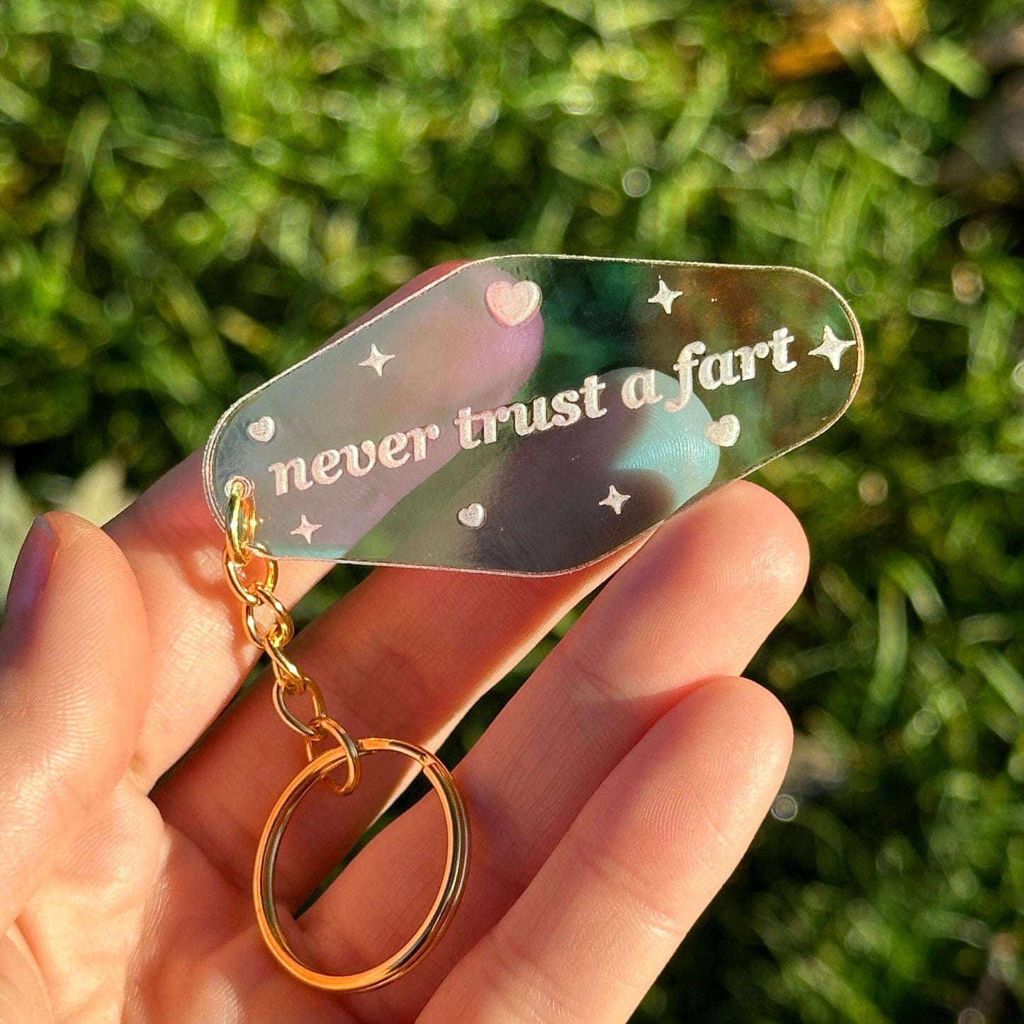 Never Trust A Fart Iridescent Acrylic Motel Keychain