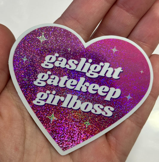 Gaslight Gatekeep Girlboss Pink/Purple Glittery Dust Sticker