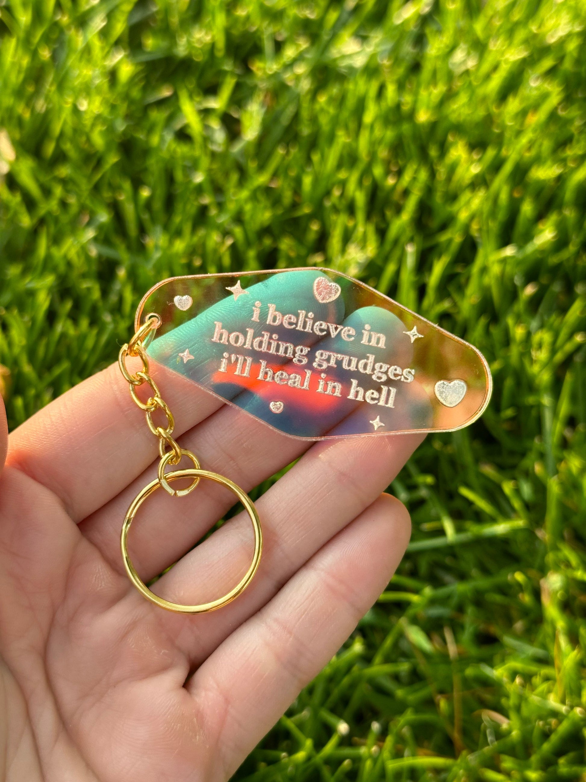 I believe in holding grudges I’ll heal in hell Iridescent Acrylic Motel Keychain