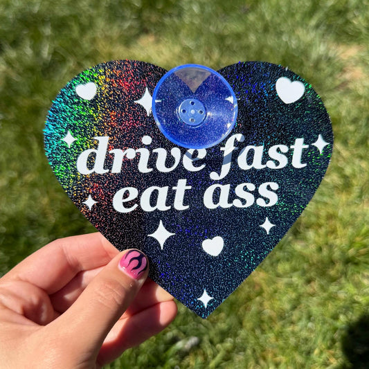 Acrylic Car Sign: Drive Fast Eat Ass – Heart Shape Sparkly Black
