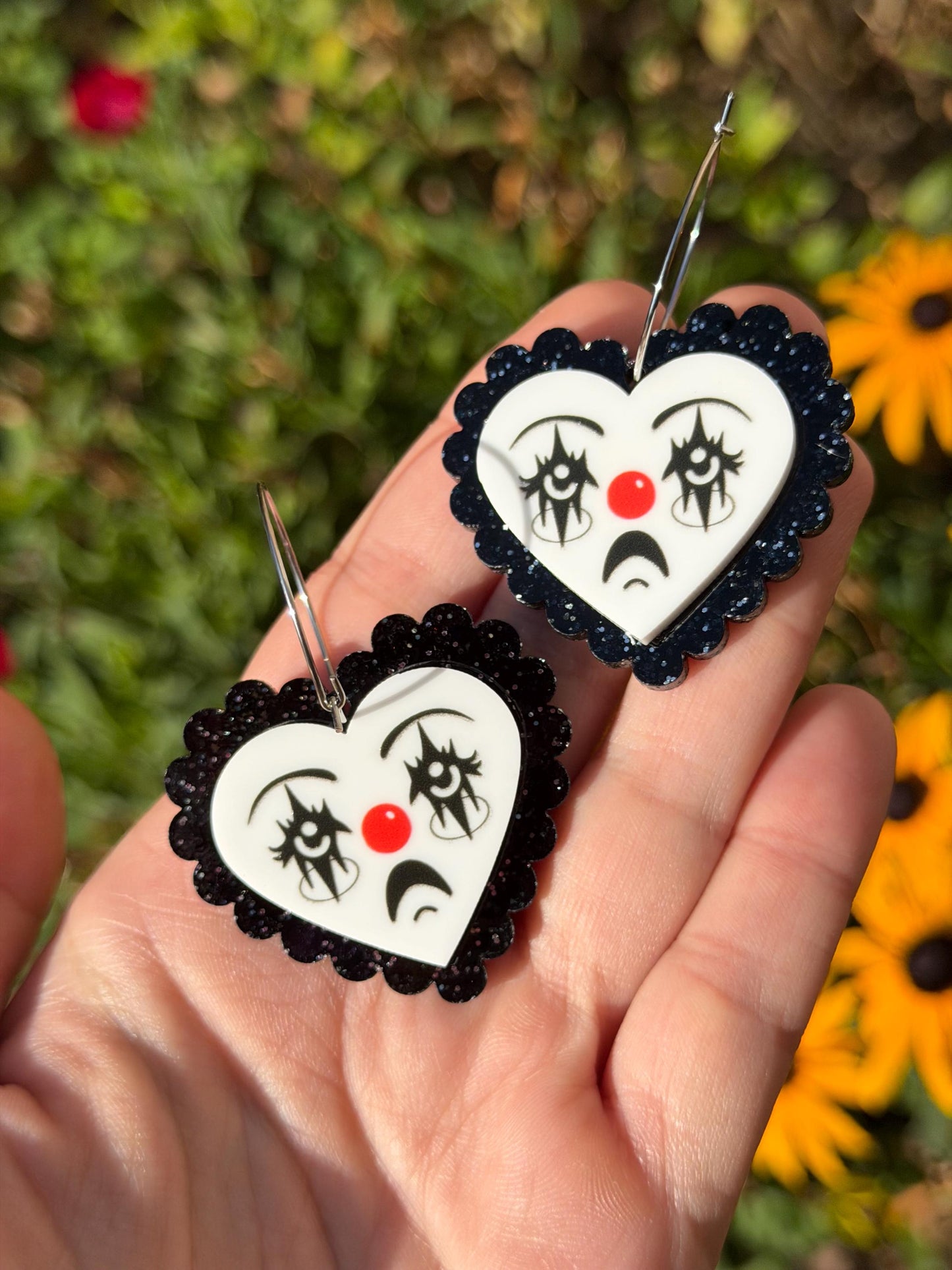 Scalloped Acrylic Clown Face Heart Hoop Earrings: Black Glitter