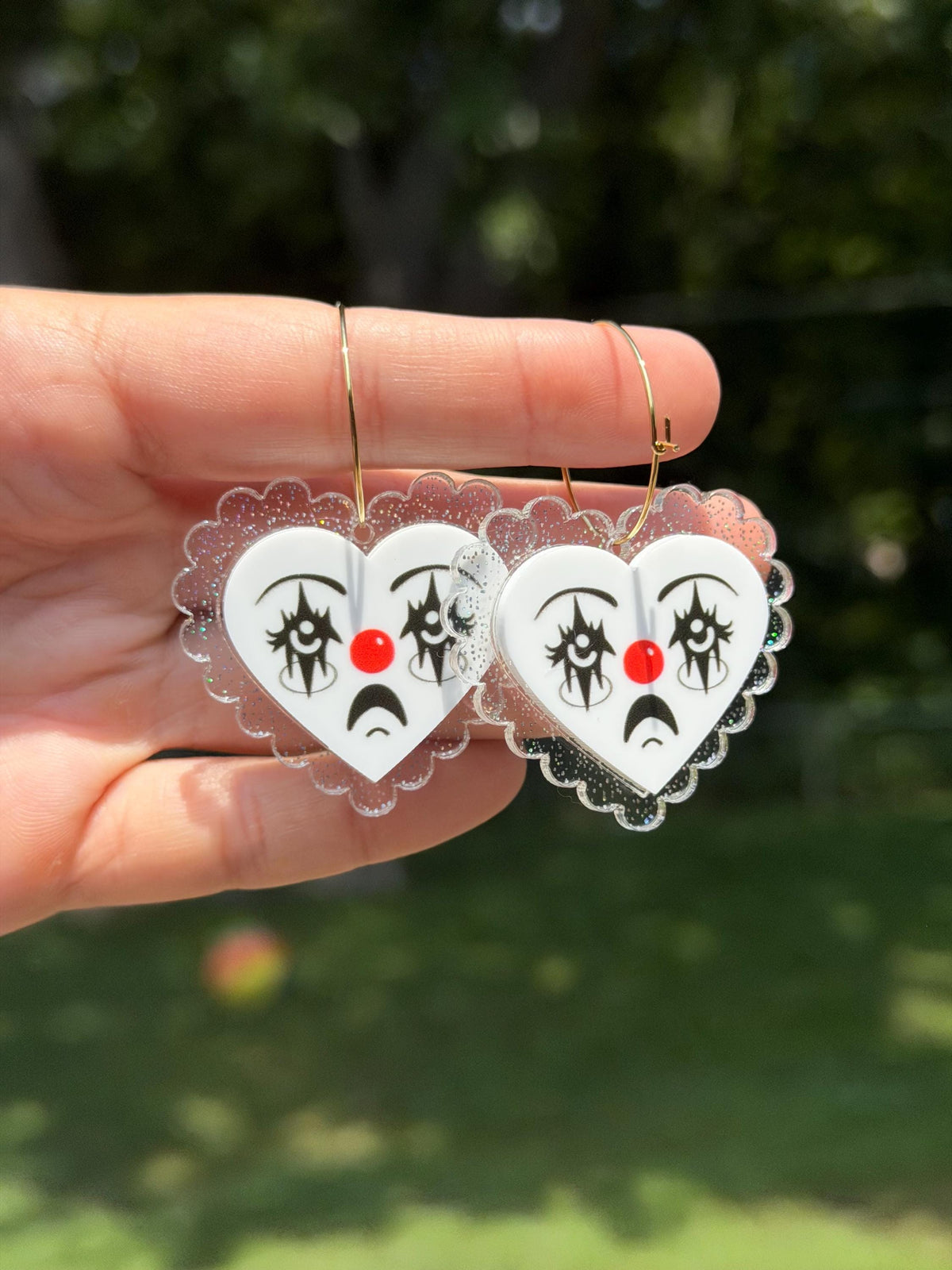 Scalloped Acrylic Clown Face Heart Hoop Earrings: Clear Holo Glitter
