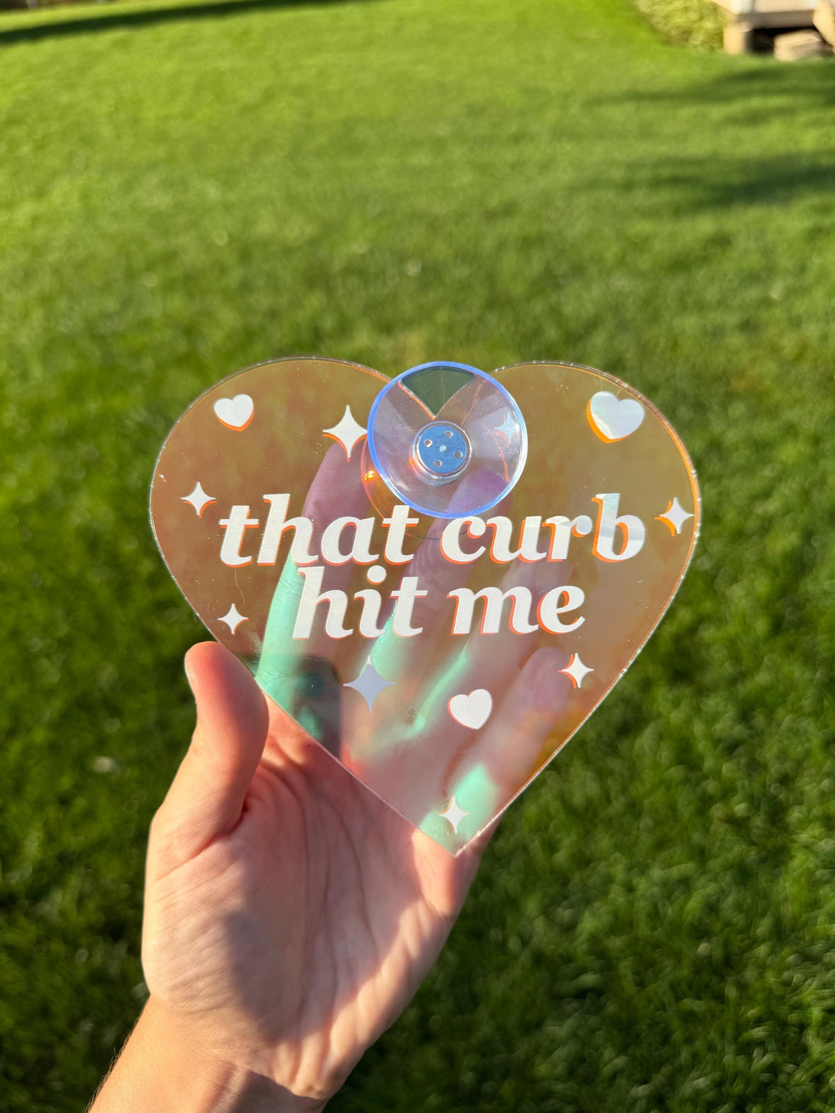 Acrylic Car Sign: That Curb Hit Me – Heart Shape