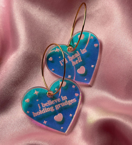 Iridescent I believe in holding grudges, I’ll heal in hell Heart Hoop Earrings
